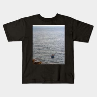 Lonely boat floating on the Mediterranean sea Kids T-Shirt